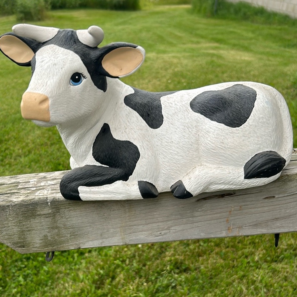 Charming Black and White Cow Sculpture